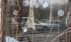 Novoletne papirnate predloge za okna Risba snežaka za novoletno okno